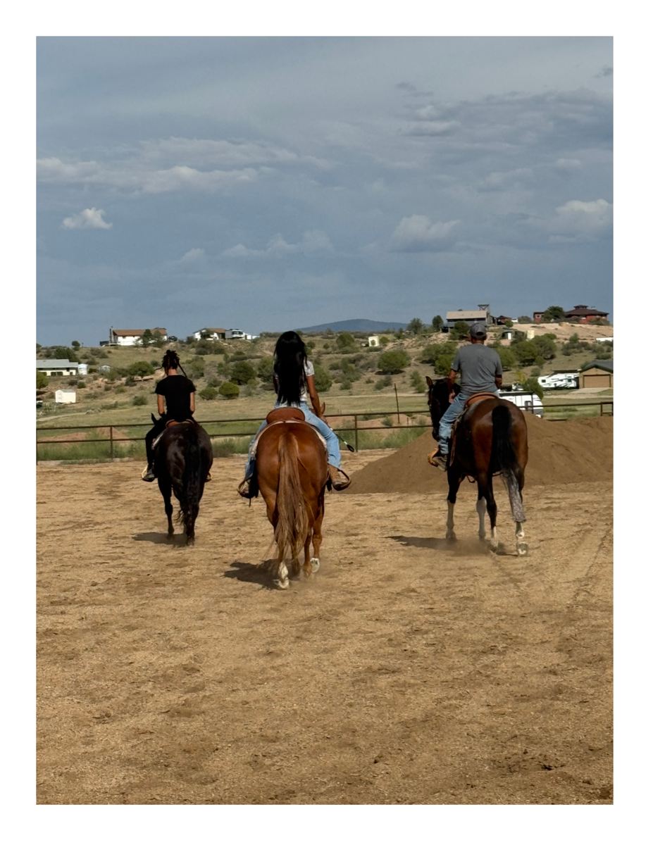 Riding together beneath the Arizona sky