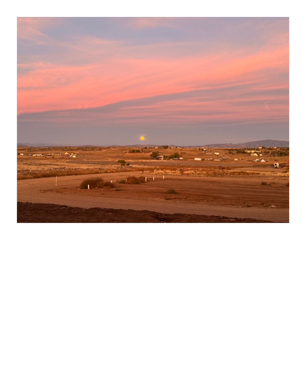 Actual Wopican Ranch landscape at sunset; camping spaces not pictured
