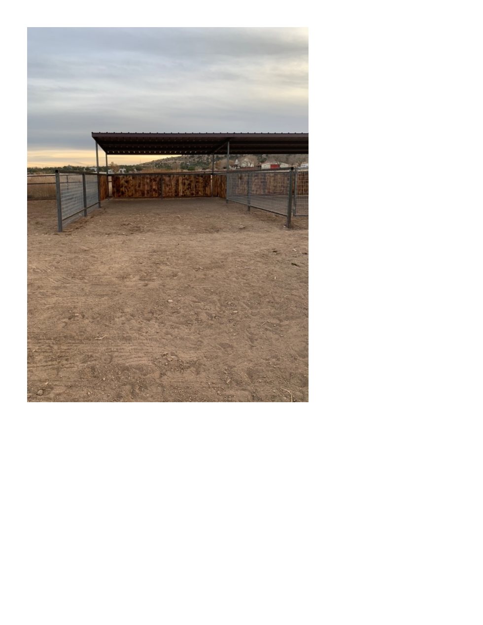Spacious covered horse shelter